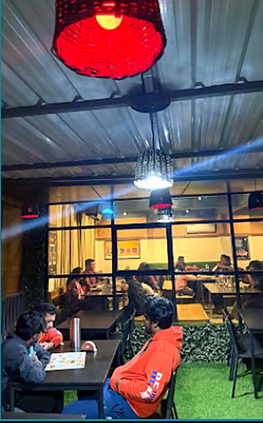 Rooftop seating with red lanterns